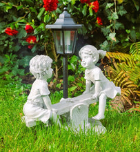 Load image into Gallery viewer, Solar Light Boy & Girl Seesaw Stone Effect Garden Ornament