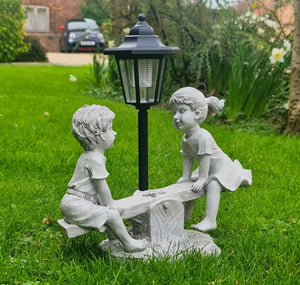 Solar Light Boy and Girl Seesaw Stone Effect Garden Ornament